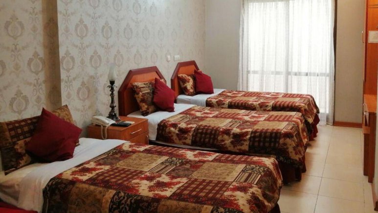 اتاق سه تخته هتل آپارتمان پارتیکان اصفهان